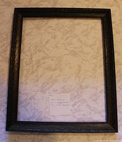 Full view of ornate brown frame