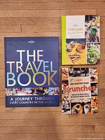 All three Lonely Planet book covers visible