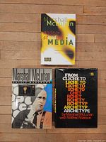 All three Marshall McLuhan hardcover books with dust jackets