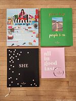 All four kate spade cloth-bound books laid out