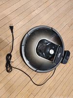 Top view of Roomba 980 with power cord visible
