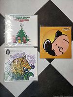 Front covers of all three records