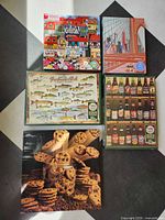 All five puzzle boxes laid out showing themes and brands