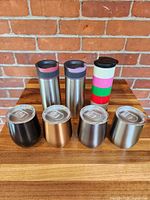Group shot of all seven stainless steel insulated drinkware pieces