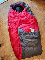 Full view of red and grey mummy sleeping bag