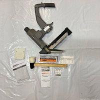 Full view of nailer with all accessories laid out