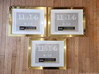 Front view of three gold Studio Decor Belmont frames with mats displayed