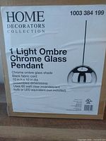Retail box showing product name, brand, features, size, and bulb specification