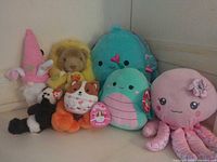 Group shot of all seven plush toys