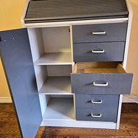 nightstand interior showing door, shelves and drawers