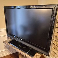 Front view of LG 42-inch flat-panel TV on stand