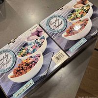 Two boxed overandback Simply Perfect 3-piece porcelain bowl sets