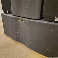 Sony center speaker with two satellite speakers stacked