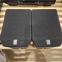 Front view of both Yamaha NX-E270 speakers with grilles