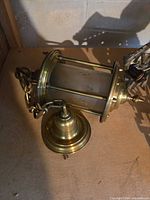 Brass cylindrical lantern body with ceiling canopy attached