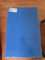 Top view of blue scalloped rectangular tabletop