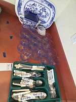 Overall view showing platter, canister, coasters, glasses and flatware tray