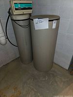 Full view of resin tank with control head and brine tank