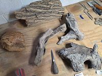 Overview of all five wood pieces on workbench
