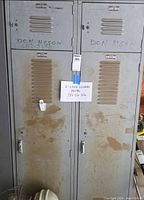 Front view showing both locker doors, vents, wear, dimensions tag
