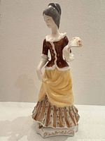 Full view of Hollohaza porcelain lady figurine