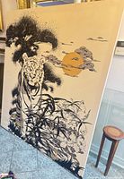 Full view of framed silk screen art showing entire tiger scene