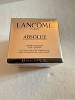 Front of sealed Lancôme Absolue Soft Cream box showing brand, product name, size 15 ml