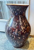 Full view of ceramic floor vase showing form and glaze