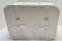 Front of white suitcase-style wedding card box showing ribbon straps, bows and herringbone texture