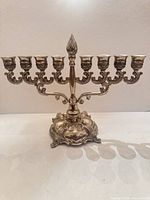 Front view of nine-light silver plated candelabrum