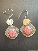 Full view of earring pair showing design, stones, hooks