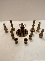 Full lot overview showing tray, coffee pot, cups, goblets and candlesticks