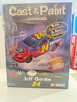 Front of sealed Cast & Paint Krazy Kars kit box showing Jeff Gordon #24 DuPont stock car image and kit details.
