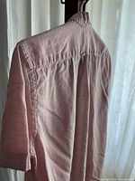 Back and side view highlighting fabric and sleeve