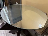 Top view of oval glass mirror showing shape and clarity