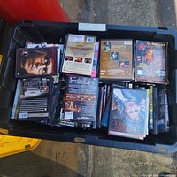 overview of tote filled with DVD, Blu-ray and CD cases