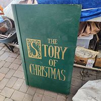 Front cover showing title "The Story of Christmas" and decorative initial