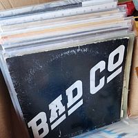 Stack of LPs in box, front record Bad Company self-titled