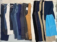 Entire lot of assorted bottoms laid out side by side to show colours and styles