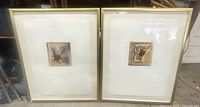 Front view showing both framed collages side by side
