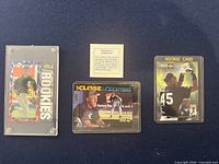 Three Michael Jordan baseball cards in holders