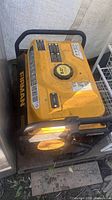 Angled front and top view of Firman 3550 generator