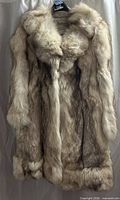 Front view of fur coat hanging