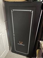 Front view of Huntshield gun safe closed