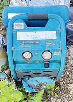 Front view showing model MAC2400 label, gauges, regulator