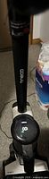 Front view of Tineco upright wet-dry vacuum showing handle and digital display
