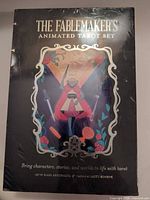Front of shrink-wrapped box showing title and artwork