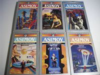 Front view of six boxed cassette sets with cover art visible