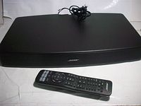 Sound base with remote in front