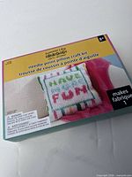 Front of sealed Creatology needle point pillow craft kit box
